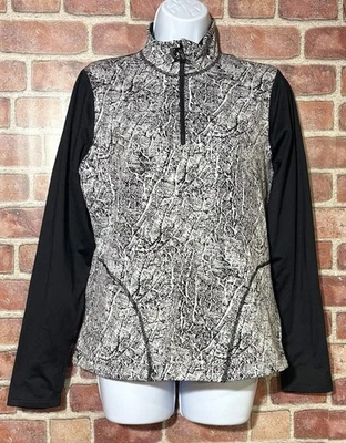 Chaqueta atlética Avia blanca y negra moteada para mujer talla M 8-10 para correr 1/4 cremallera Foto 1 de 4