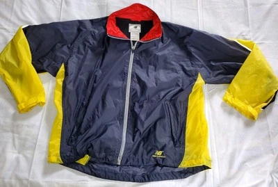 Chaqueta cortavientos New Balance de colección cremallera completa ligera para correr XL azul amarillo Foto 1 de 4
