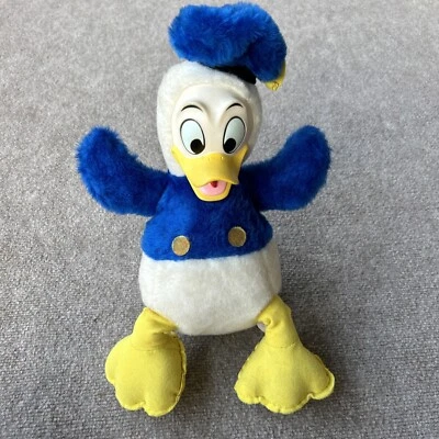 Juguete de peluche vintage de los años 50 con cara de goma del pato Donald de producción de Walt Disney Foto 1 de 4