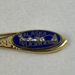 Cucchiaio ricordo slitta cane Alaska 4,5” tono oro made in USA - Foto 1 di 4