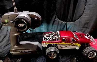 LOSI RADIO CONTROLED CAR COMES WITH CAR  AND REMOTE 2.4GHz, AVANTI ?? - Image 1 of 4