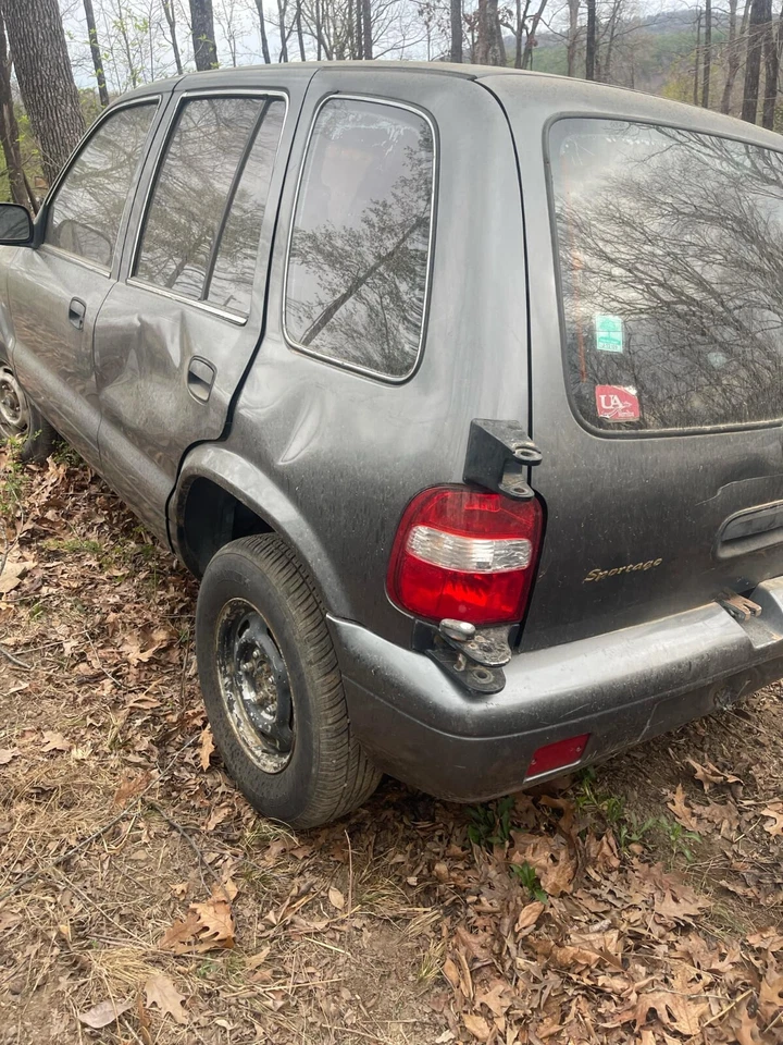 Левый задний фонарь 2001 Kia Sportage; от оригинального производителя - Изображение 1 из 1