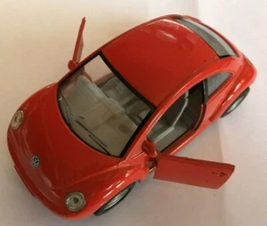 Kinsmart - Diecast New Beetle Volkswagen -1:32 w/pull back wheels & doors open - Picture 1 of 6