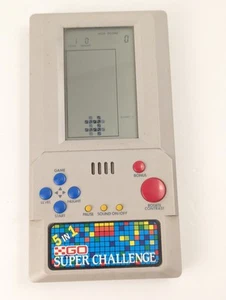 Vintage Electronic Game GO SUPER CHALLENGE 5 in 1 Handheld Game Tested Working - Imagen 1 de 7