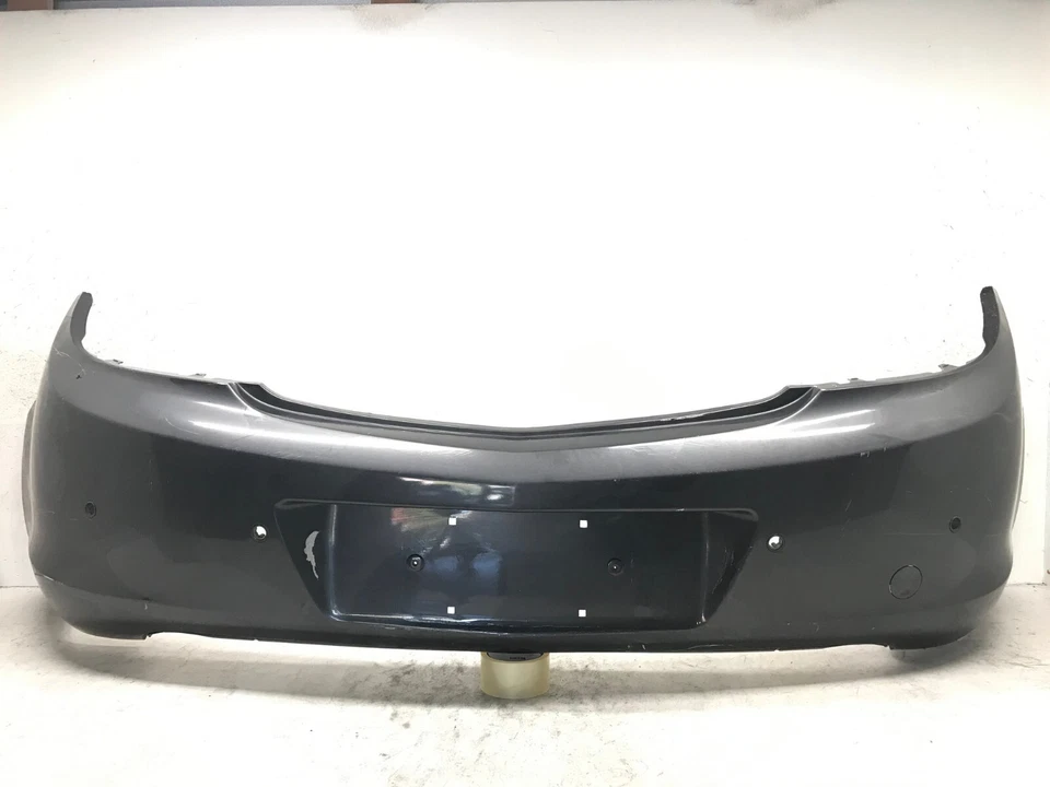 Cubierta de parachoques trasero gris Opel Insignia A 2008-2017 con orificios de sensor 3850545 OEM Foto 1 de 4