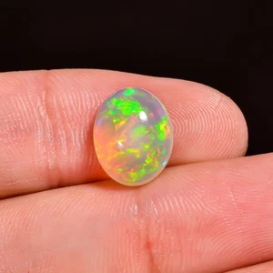 3 Ct Ethiopian Opal 12x9x5 mm Oval Cabochon Multi-Color Fire Play Loose Gemstone - Picture 1 of 3