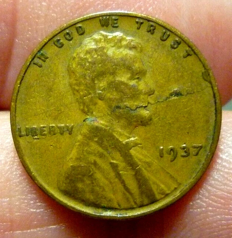 LINCOLN "BLOWING SMOKE"  -  1937-P LINCOLN CENT -  LAMINATED OBVERSE Cover