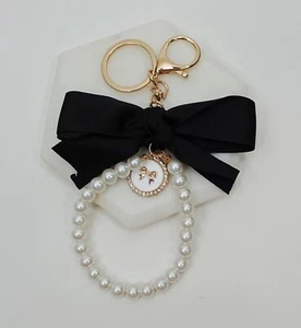 Llavero Perla Imitación Cinta Negra Llaveros Elegante Arco Colgante Bolso Clip Llave Teléfono - Imagen 1 de 6