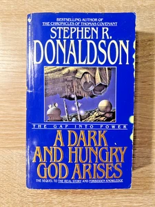 A Dark and Hungry God Arises Stephen R. Donaldson Paperback Book Sci-Fi 1992 - Picture 1 of 13