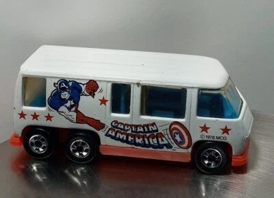 Hot Wheels "MÁQUINA DE ESCENA" VARIACIÓN - GMC Autocaravana CAPTAIN AMERICA VAN HK '76. Foto 1 de 2