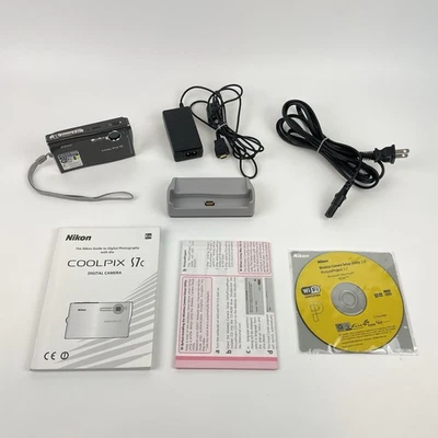 Nikon COOLPIX S7c 7.1MP Digital Camera Black Charger Docking Station Tested - Image 1 of 4