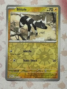 Pokémon TCG Blitzle 062/191 Sv08: Surging Sparks Reverse Holo - Picture 1 of 1