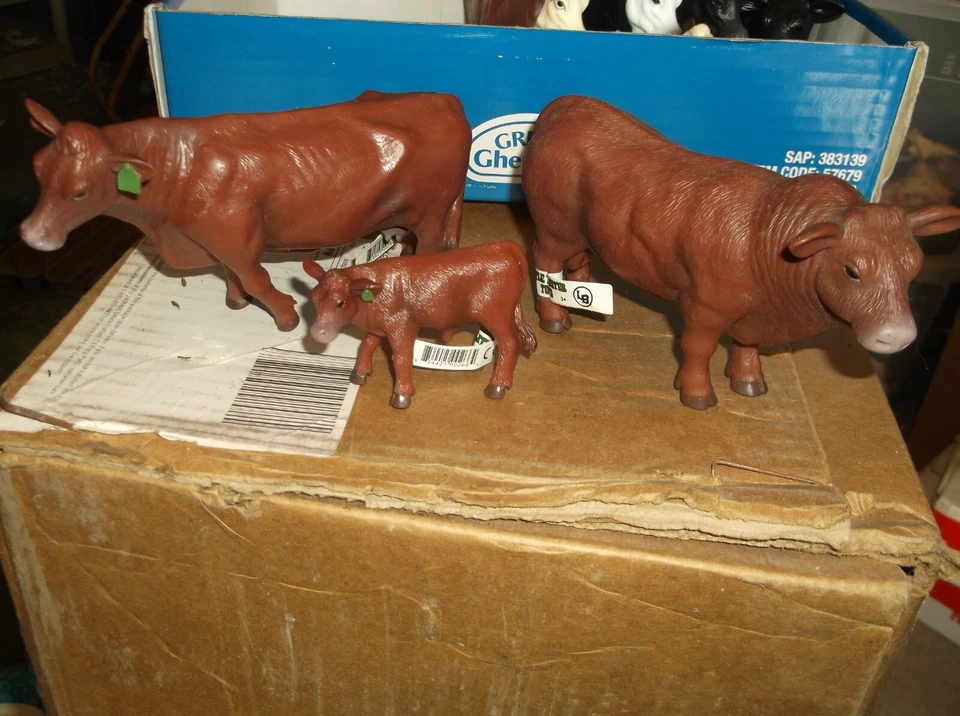 LITTLE BUSTER FAMILY TRIO BULL, COW, CALF,  RED ANGUS - Image 1 of 1