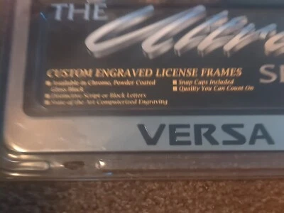 Engraved VERSA Chrome Plated Metal License Plate Frame - Image 1 of 4