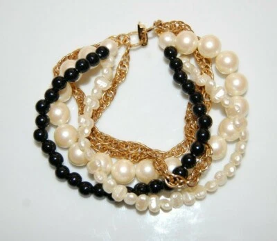 PULSERA ELEGANTE DE COLECCIÓN PERLAS DE IMITACIÓN DE ALTA COSTURA Y CADENAS DORADAS MULTI HEBRA Foto 1 de 4