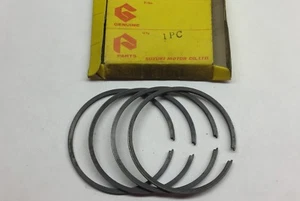 NEW OEM SUZUKI T20 TC250 RINGS RING SET 1.00 OVER 12140-11712 - Foto 1 di 1