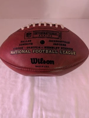 Serie Internacional de la NFL 2014 Wilson Auténtico Duke Fútbol Jaguars Vaqueros Foto 1 de 4