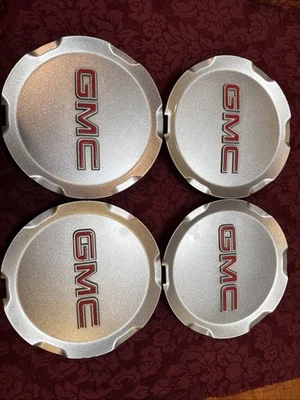 JUEGO DE 4 TAPAS CENTRALES DE TERRENO GMC ORIGINALES 2010-2015 P/N 9597973 plateadas OEM Foto 1 de 4