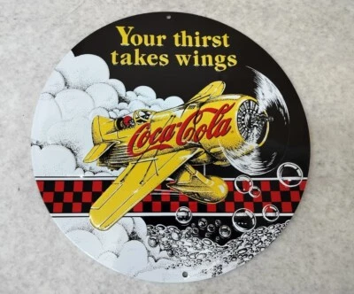 Ande Rooney Signs Coca-Cola Gee Bee Your Thirst Takes Wings Embossed Tin Sign  - Image 1 of 4