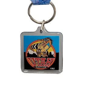 Toronto Raptors Dinosaur Logo Acrylic Keychain Souvenir NWT - Picture 1 of 5