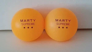 2 MARTY SUPREME 2025 OFFICIAL PROMO ORANGE TISCHTENNISBÄLLE TIMOTHEE CHALAMET - Bild 1 von 1