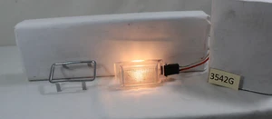 1988 PONTIAC SUNBIRD COURTESY LIGHT RIGHT OR LEFT OF DOOR FRAME AND PIG TAIL - Picture 1 of 11