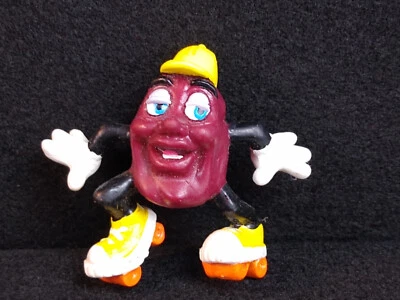 Boneco de brinquedo California Raisins patinação PVC vintage 1988 aplausos 2 polegadas  - Imagem 1 de 4