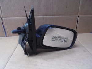 TOYOTA YARIS 1999-2005 FUERA DE JUEGO LADO DEL CONDUCTOR ESPEJO RETROVISOR DE PUERTA MANUAL PLÁSTICO NEGRO - Imagen 1 de 5