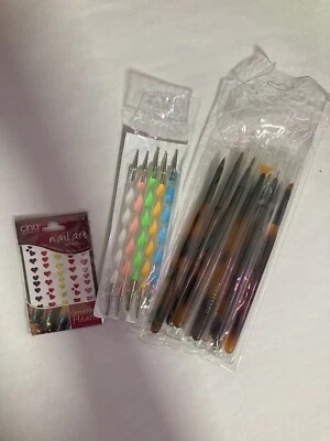 Lot of Nail Art Supplies: Wrapped Brushes, Dotting Tool, and Stickers - Image 1 of 4