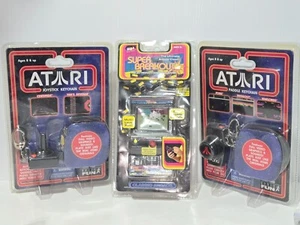Atari Joystick 7 Paddle Keychain 2006 *NEW* +Super Breakout Asteroids - Picture 1 of 2