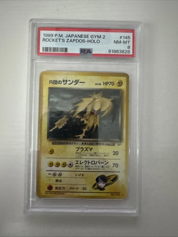 Rocket's Zapdos PSA 8 Pokemon #145 1999 Gym 2 Japanese Pokemon - Image 1 of 1