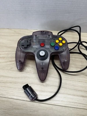 Controlador ATOMIC OEM Nintendo 64 N64 púrpura transparente auténtico dañado Foto 1 de 4