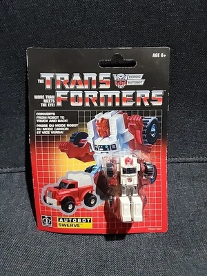 New HASBRO TRANSFORMERS  REISSUE AUTOBOT SWERVE MISB  - Image 1 of 4