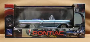 New-Ray Maßstab 1:43 1957 Pontiac Bonneville Neu in OVP mit Koffer - Bild 1 von 8