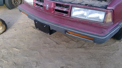 Olds Eighty Eight 1990 1991 conjunto de cubierta de parachoques delantero rojo fabricante original Foto 1 de 4