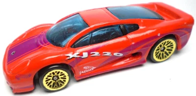Hot Wheels Jaguar XJ220 1992 rojo 1:64 diecast coche de 3" con llantas moradas y azules doradas Foto 1 de 4