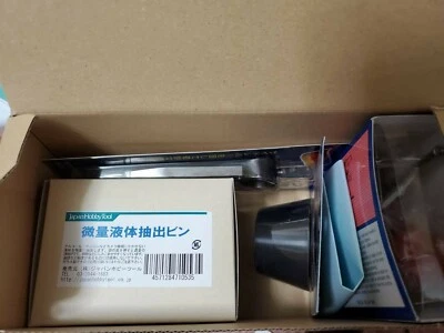 Juego de herramientas de reparación de lentes de cámara abridor ventoso brújula limpiador botella Foto 1 de 4