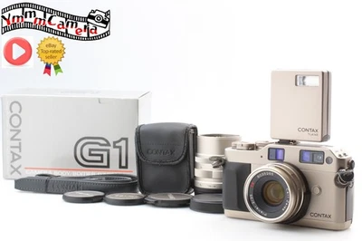 Cámara fotográfica Contax G1 de 35 mm 90 mm TLA140 2 lentes [COMO NUEVA en CAJA con flash] Foto 1 de 4
