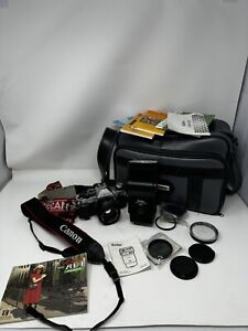 Canon AE-1 Program 50MM 1:1.8 Cannon Lens With Extras See Description