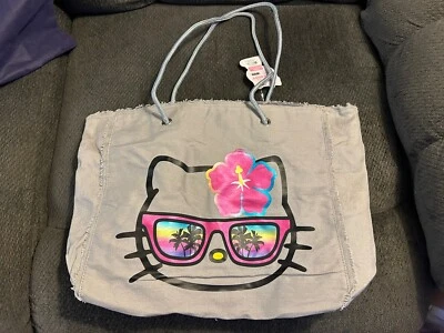 Nuevo con etiquetas Bolso de Mano Ligero Hello Kitty Tropical Arco Iris Gafas de Sol Foto 1 de 4