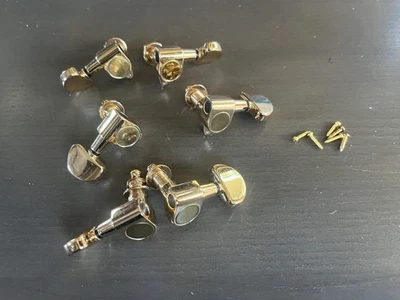 Sintonizadores electromáticos Gretsch 3 X 3 dorados con tornillos Foto 1 de 4