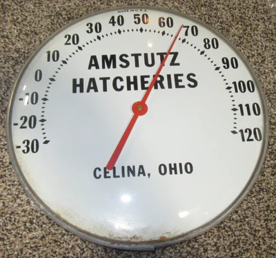 Vintage Amstutz Hatcheries Glass Front 12" Round Advertising Thermometer - Image 1 of 4