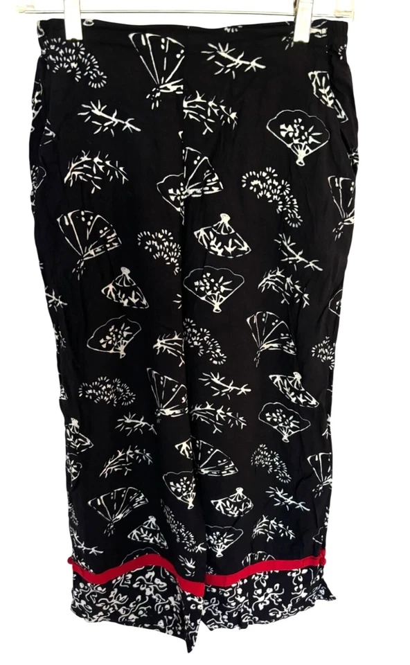 Pantalones de rayón Nomadic Traders para mujer negros blancos con estampado floral talla pequeña Foto 1 de 4