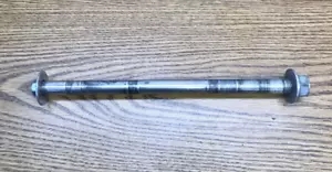 SUZUKI GSX250R 2018- 2023 REAR AXLE PART # 64711-48H10 - Picture 1 of 7