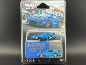 Mini GT Mazda RX-7 RE-Amemiya 20B NA 3ROTOR-7 “Ama-San Go” #1046 1/64 - Foto 1 di 6