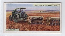 Products of the world 1928 #47 Sowing wheat seeds by Tractor, Canada