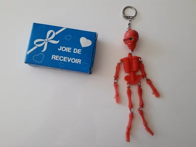 Squelette gadget tirette fete foraine ducasse - Photo 1/3