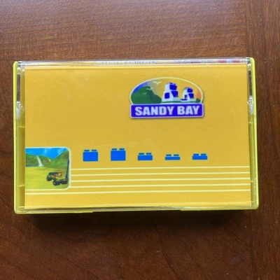 Polymono Sandy Bay YELLOW cassette #/25 Limited NM/NM Like New Vaporwave LEGO - Image 1 of 4