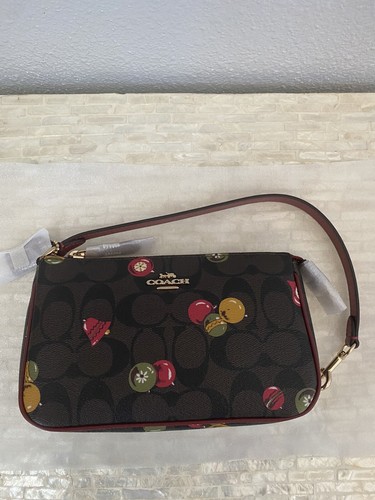 Coach Nolita 19 in tela firmata con stampa ornamentale oro marrone nero multi