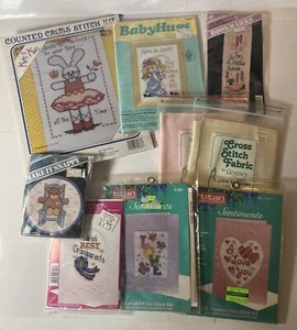 Verschiedenes Konvolut Kreuzstich-Sets. Sets für Kinder, Babyhugs, Titan… - Bild 1 von 9